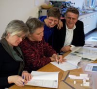 signing of the contract. from left to right: Karin van Kesteren, Manigarbha, Akasasuri, Hein Gietema (all trustees of Metta Vihara, including Dhammaketu from Belgium who could not be present)